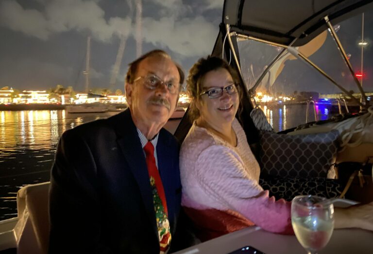 Happy Couple Romantic Date Pink Sweater Downtown St Augustine Sailing Night Wine Suit and Tie