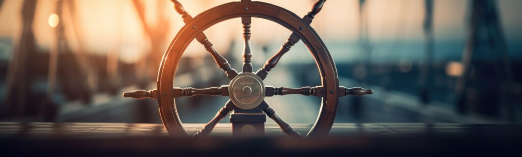Steering wheel on ship banner - Skipper Path
